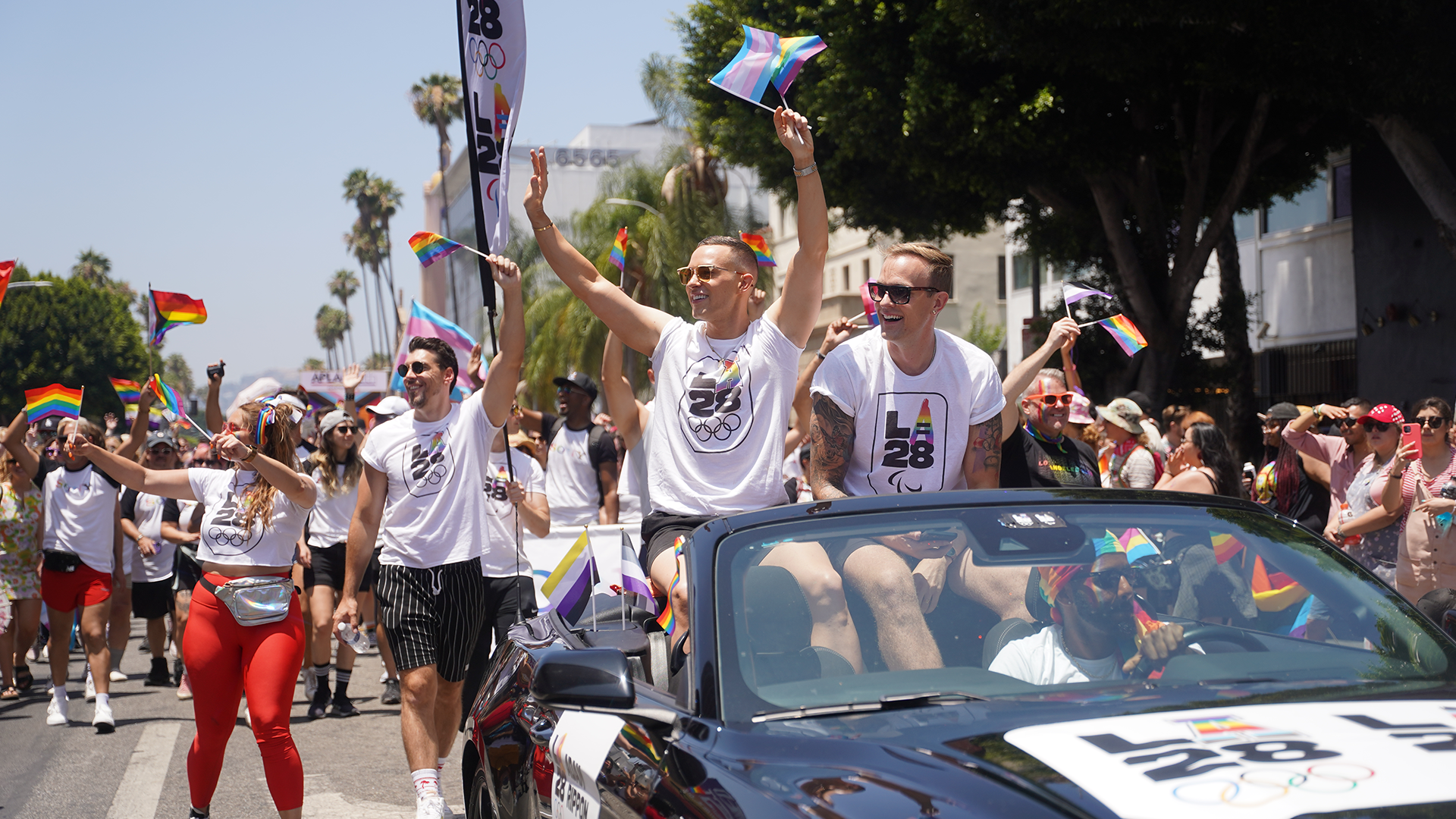 Adam Rippon and Jussi-Pekka Kajaala at LA Pride Parade with LA28