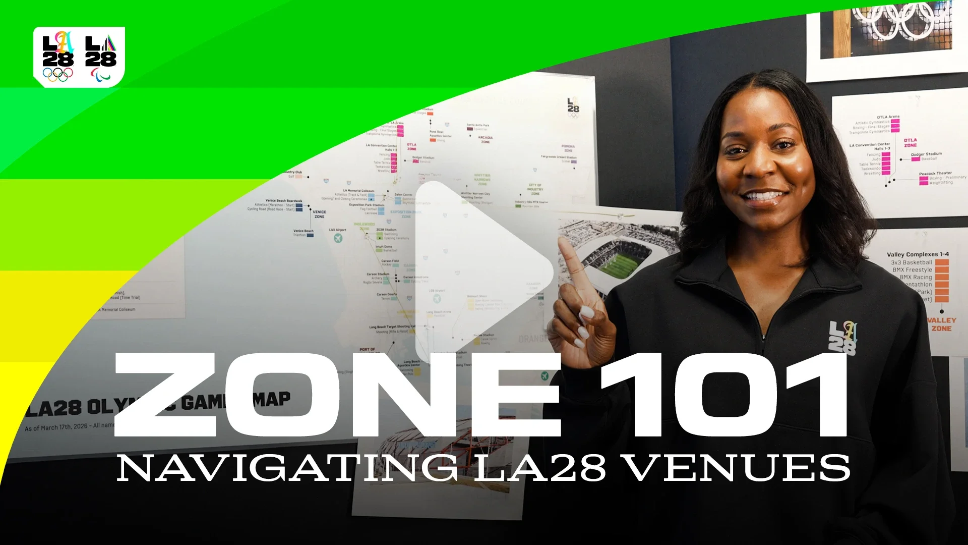 Woman smiling standing in front of graphs and charts, the words Zone 101 overlayed on top of image