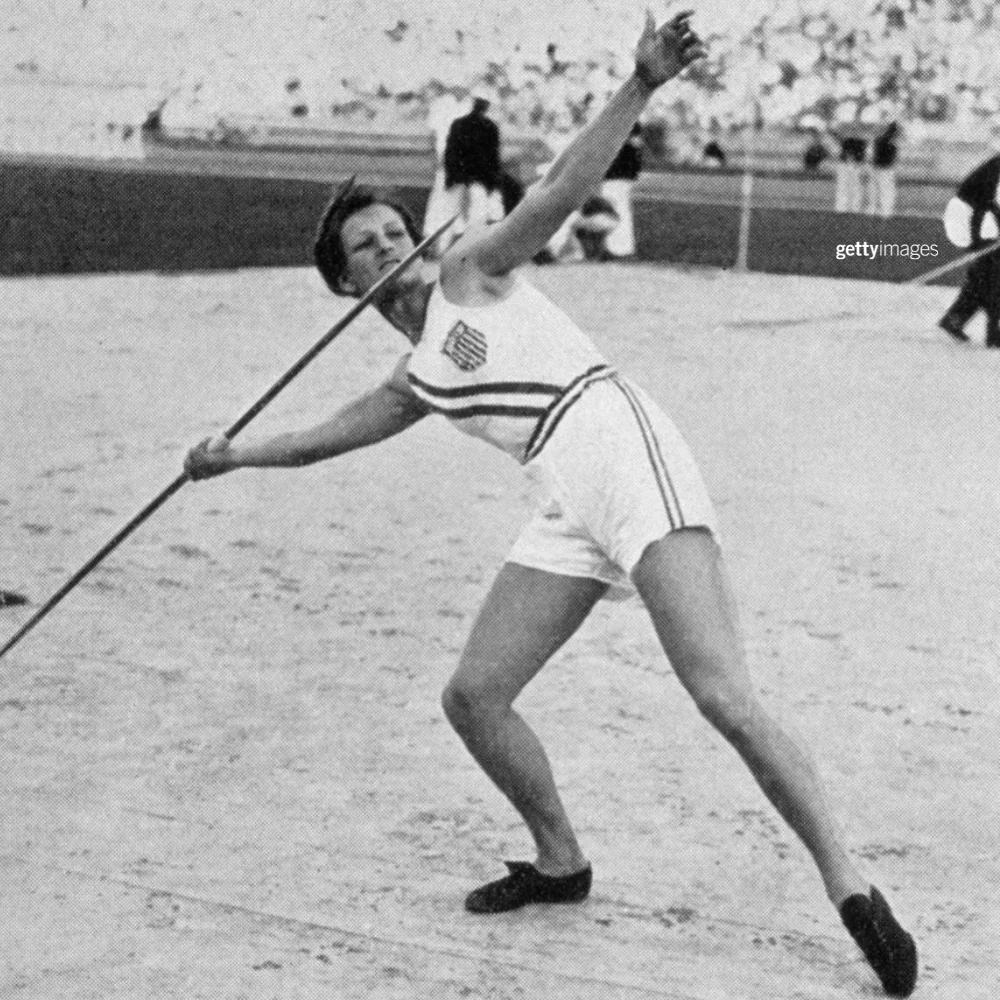 Babe Didrikson throwing a javelin on the field of the LA Coliseum at the 1932 Games.