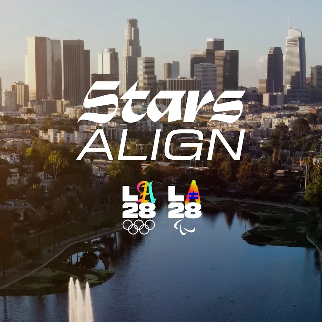 Image of Echo Park and Downtown Los Angeles skyline with the words "Stars Align" and the LA28 dual emblems superimposed on top.