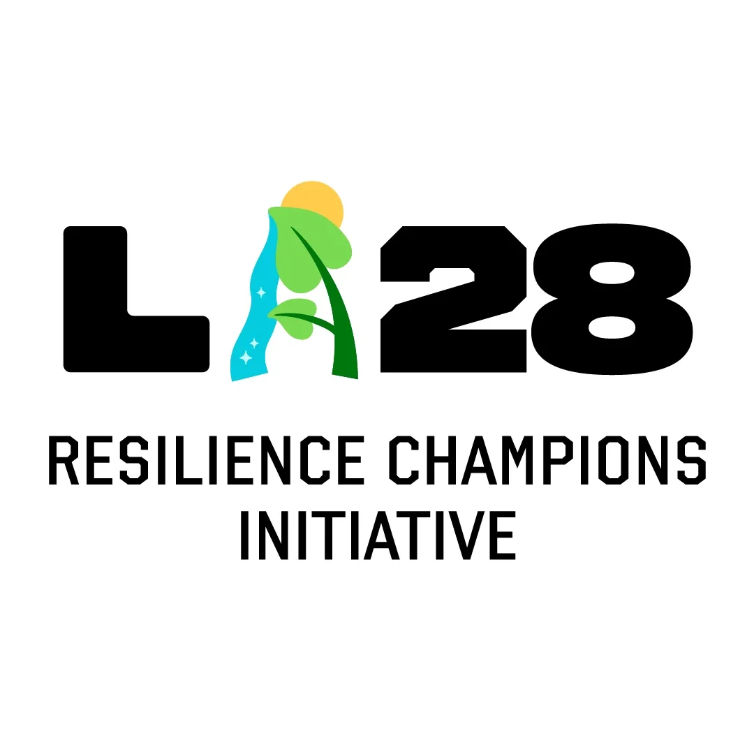 LA28 dual emblems on bluebell background