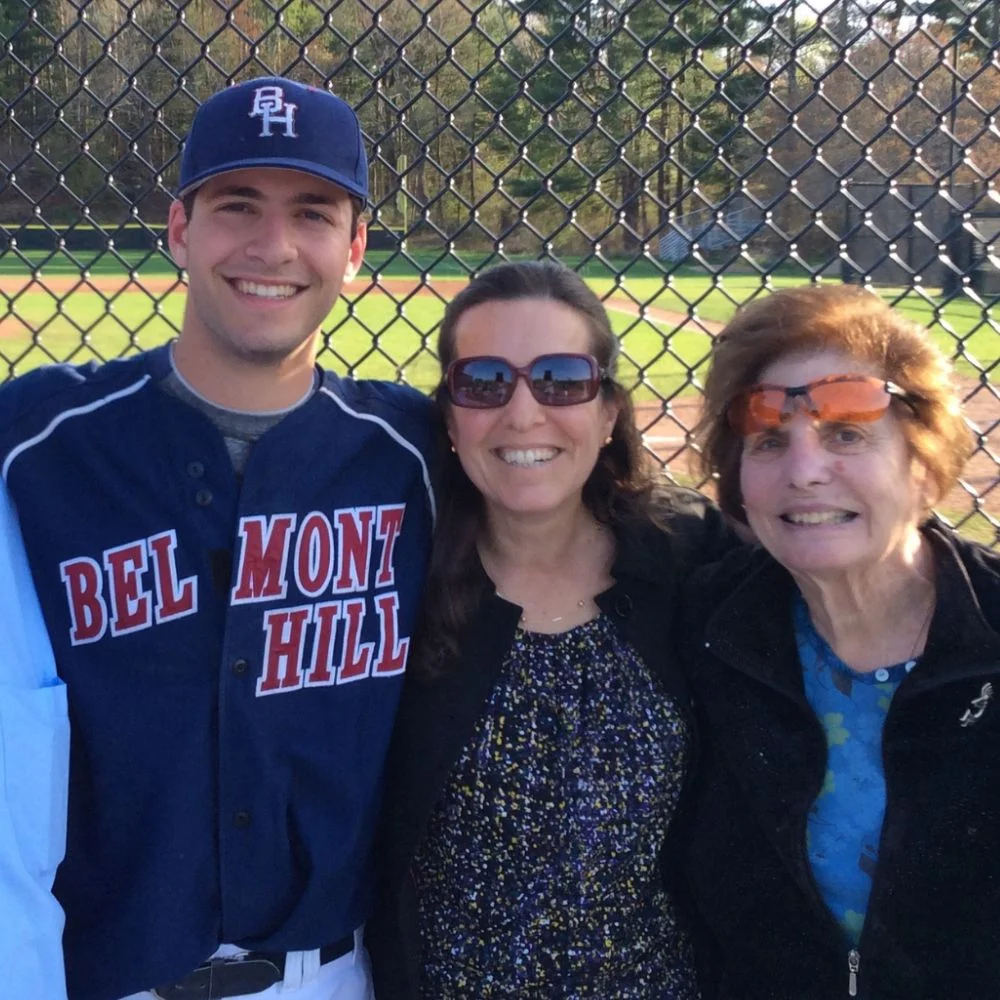 Ben Wanger smiling next to his mother and grandmother