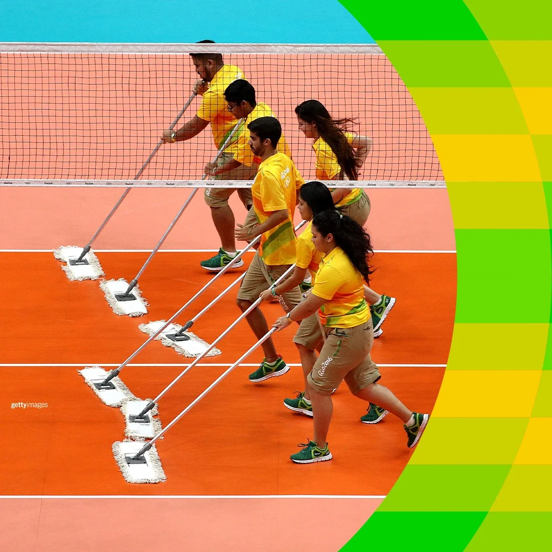 Image of Games-time Volunteers cleaning a track